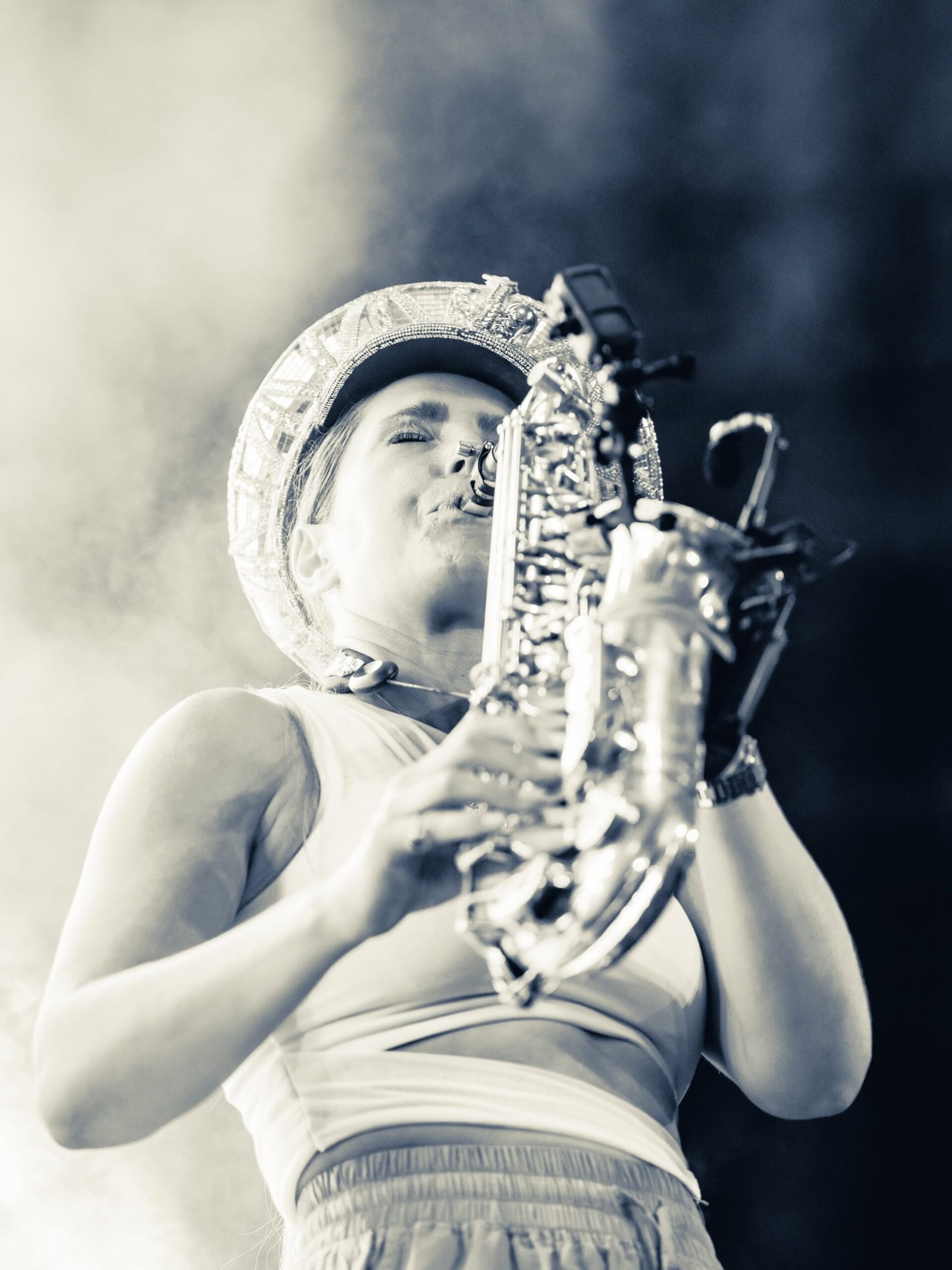 Black and white close-up of Ellie Sax performing
